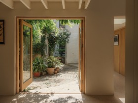 The Old Dairy - exposed brick wood paneling courtyard cobblestone french doors industrial modern gym rustic modern shabby chic - thumbnail