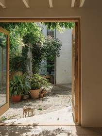 The Old Dairy - exposed brick wood paneling courtyard cobblestone french doors industrial modern gym rustic modern shabby chic - thumbnail