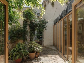 The Old Dairy - exposed brick wood paneling courtyard cobblestone french doors industrial modern gym rustic modern shabby chic - thumbnail